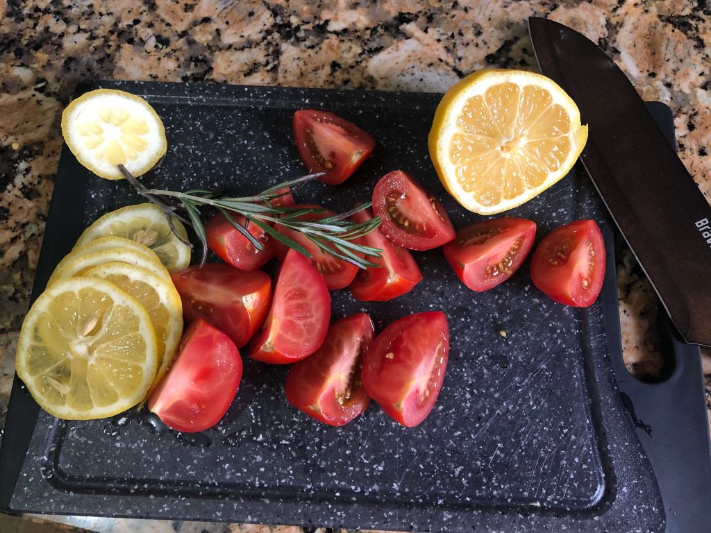 cut tomatoes and lemon
