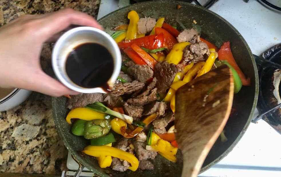 pour soy sauce to the stir fry